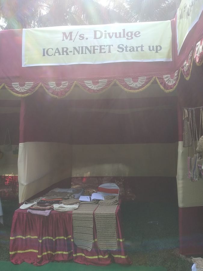 A stall with a banner reading 'M/s. Divulge, ICAR-NINFET Start up'